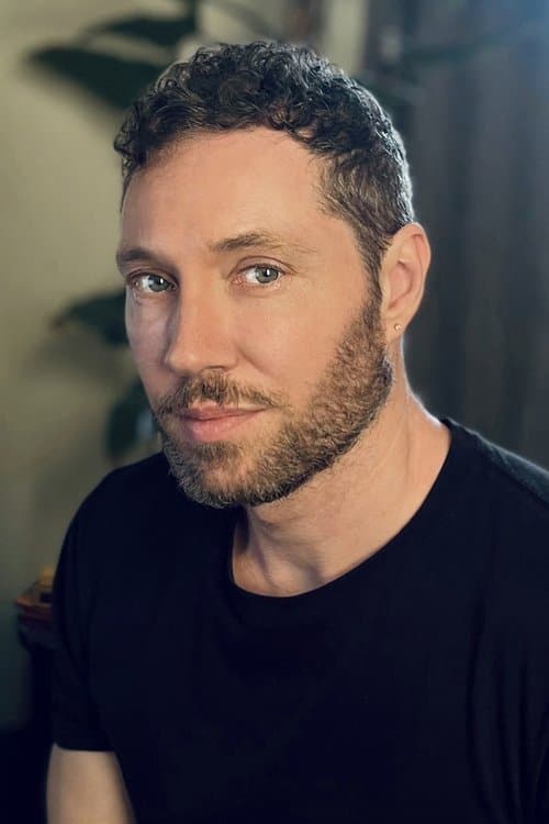 A portrait of Aaron Wilson