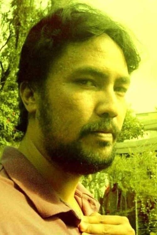 A portrait of Abbo Q. Dela Cruz