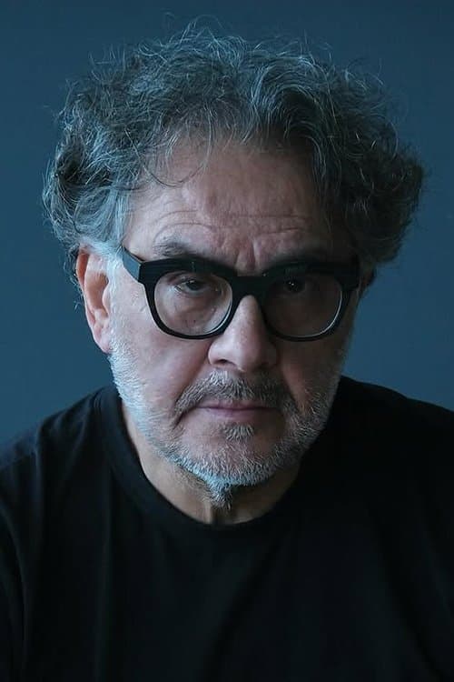 A portrait of Abdullah Oğuz