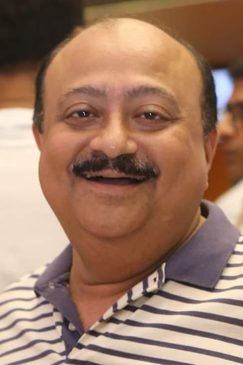 A portrait of Abhijit Guha