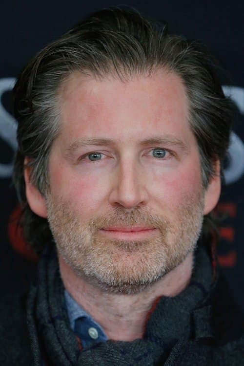 A portrait of Adam Cooper