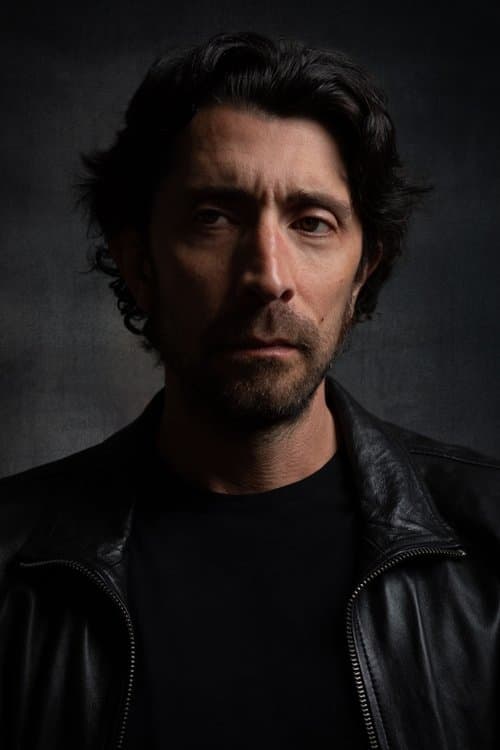 A portrait of Adam Cushman
