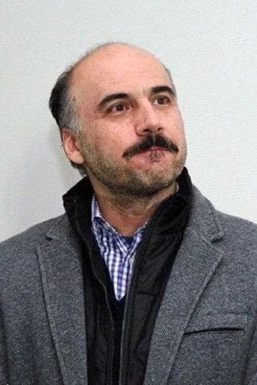 A portrait of Adel Yaraghi