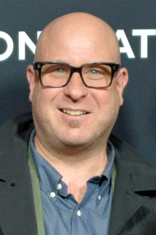 A portrait of Adrian Grünberg