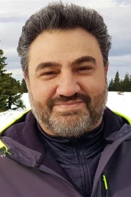 A portrait of Alper Mestçi