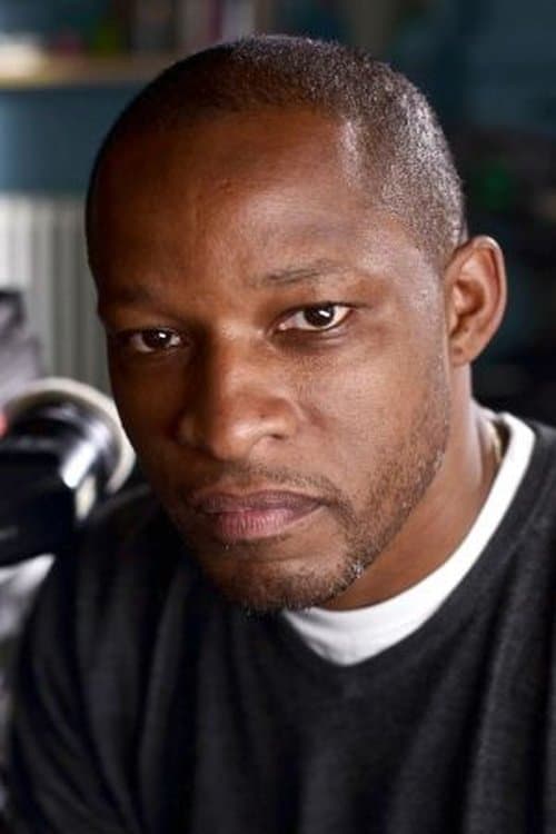 A portrait of Alrick Riley