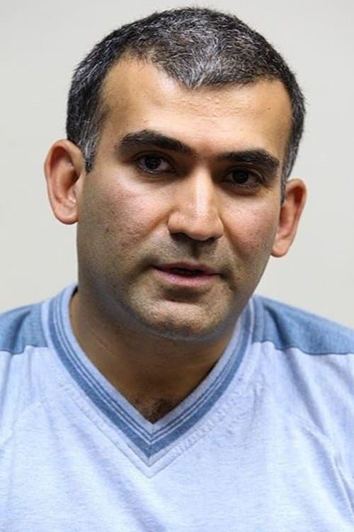 A portrait of Arash Moayyerian