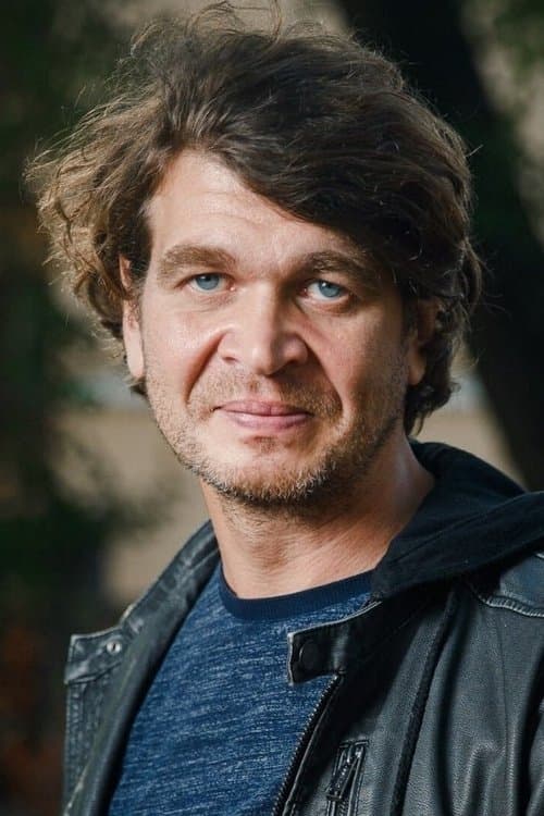 A portrait of Arbo Tammiksaar