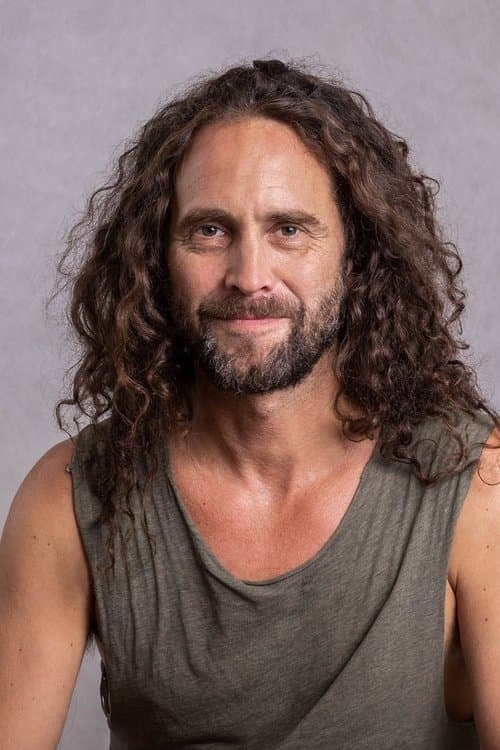 A portrait of Áron Gauder