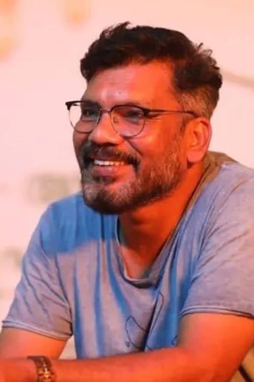 A portrait of Ashraf Hamsa