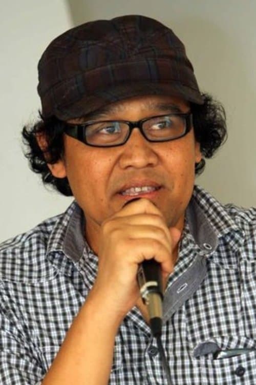 A portrait of Benni Setiawan