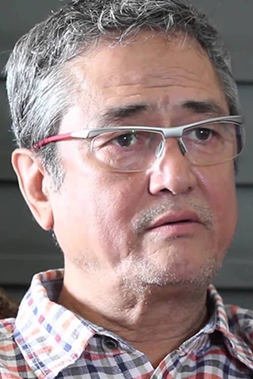 A portrait of Binod Pradhan