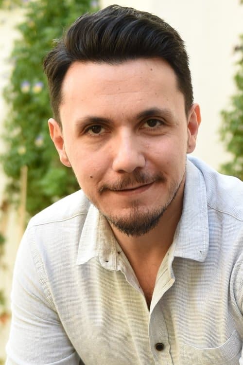 A portrait of Burak Aksak