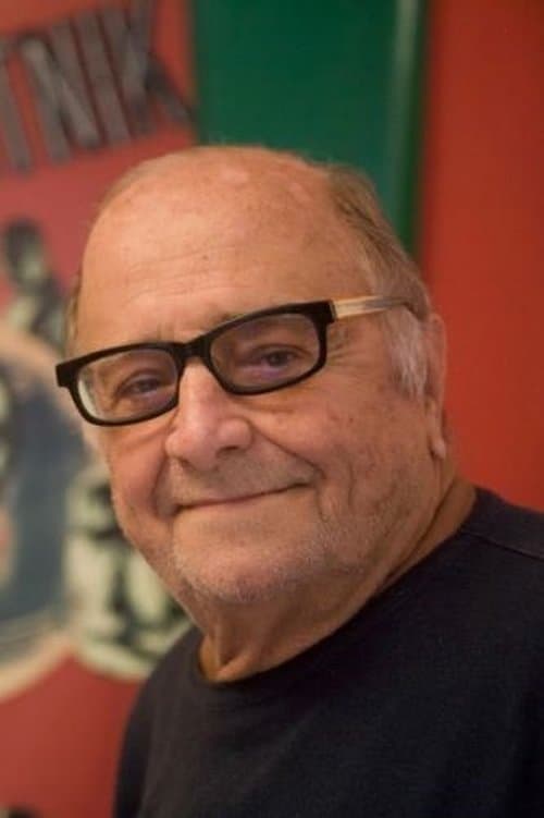 A portrait of Carlos Manga