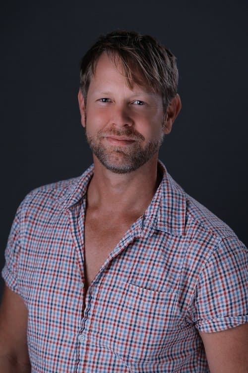 A portrait of Christopher Amos