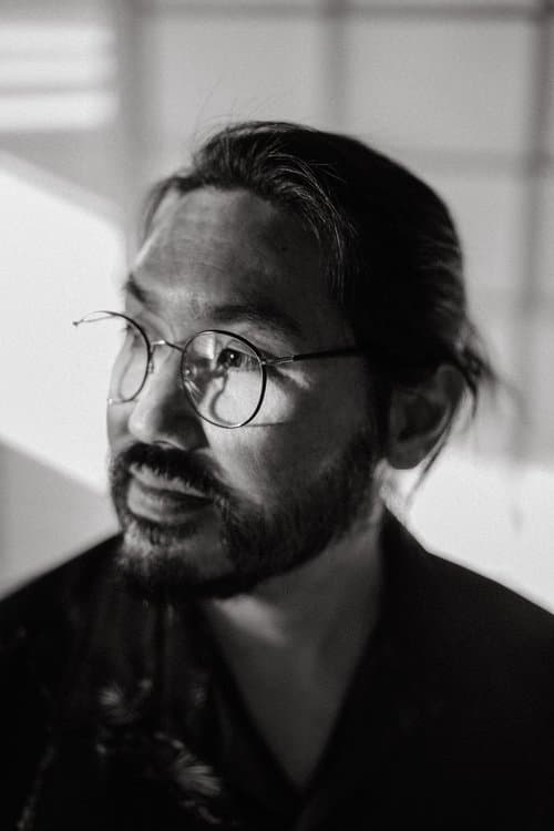 A portrait of Christopher Makoto Yogi