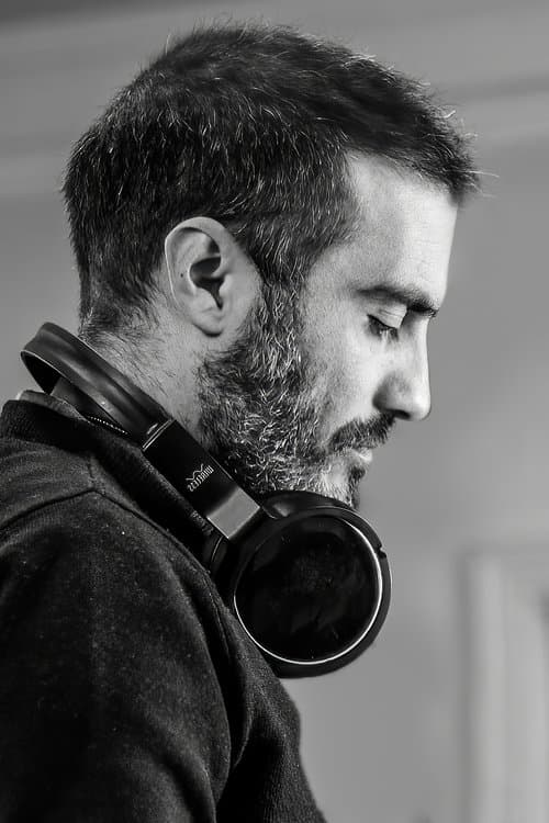 A portrait of Cüneyt Karakuş