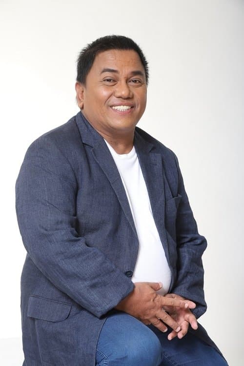 A portrait of Dado C. Lumibao