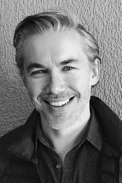 A portrait of Damien Power