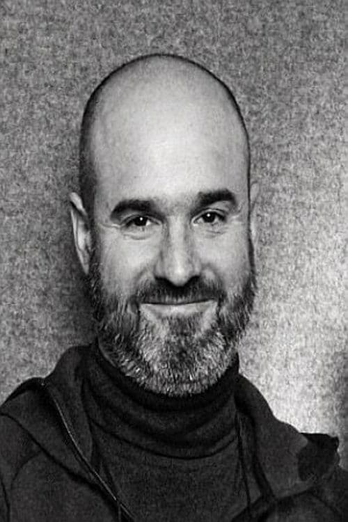 A portrait of David Alaux