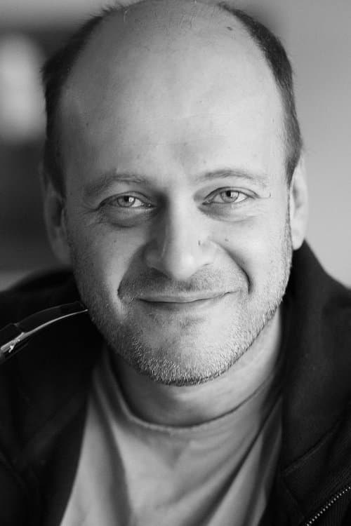 A portrait of Denis Evstigneev