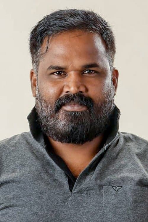 A portrait of Dennis Manjunath