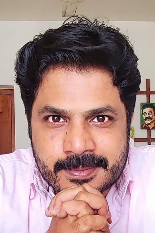 A portrait of Dinjith Ayyathan