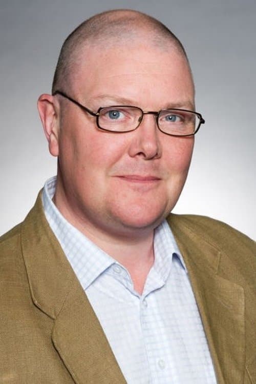 A portrait of Dominic Brunt