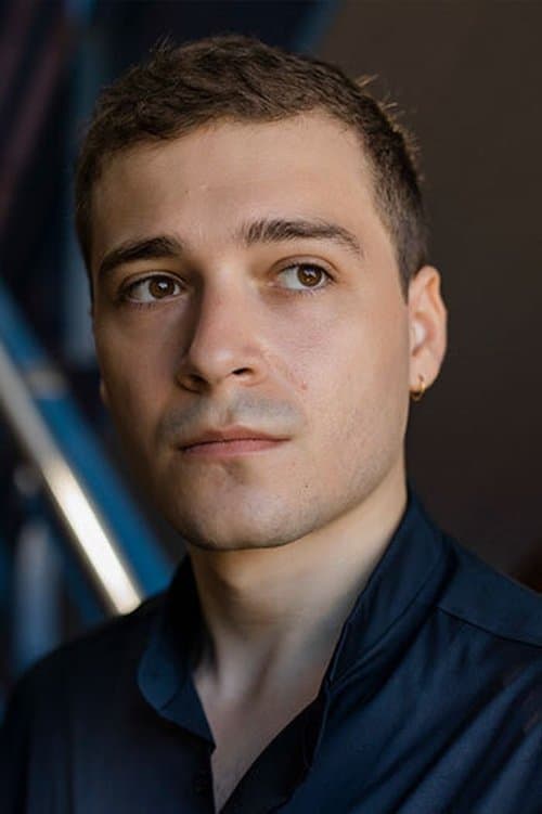 A portrait of Elie Grappe