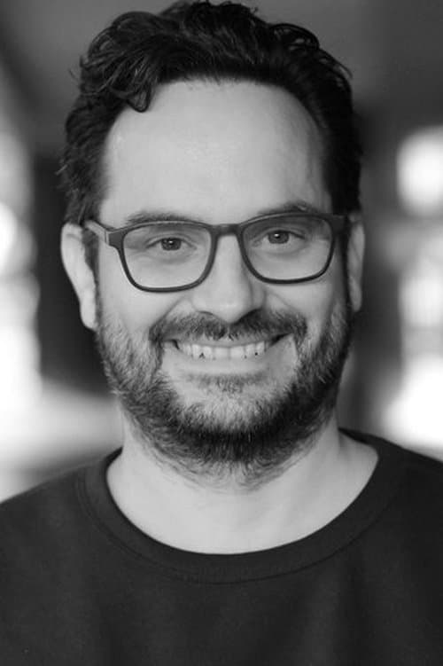 A portrait of Emre Şahin