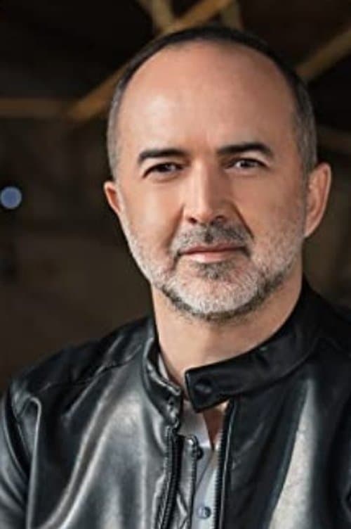 A portrait of Erdal Murat Aktaş