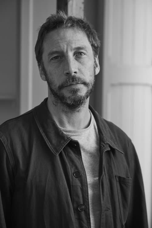 A portrait of Eric Baudelaire