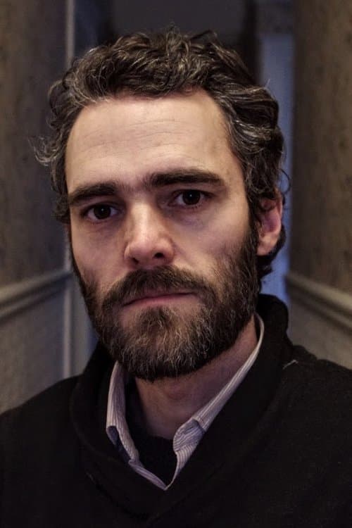 A portrait of Eric Daniel Metzgar