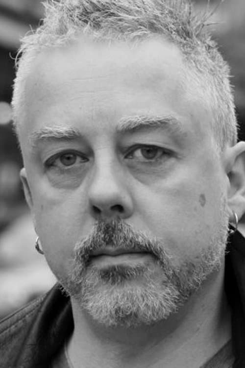 A portrait of Érik Canuel