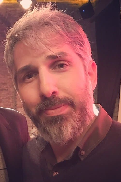 A portrait of Erol Özlevi
