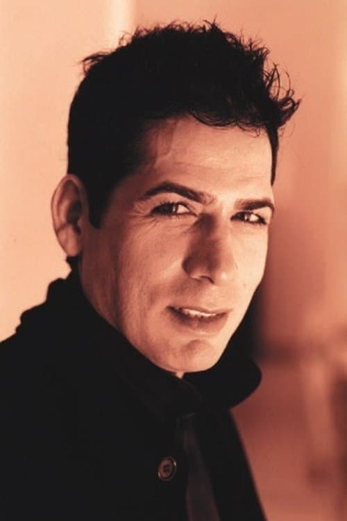 A portrait of Farhad Mann