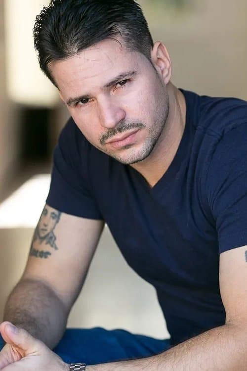 A portrait of Geo Santini