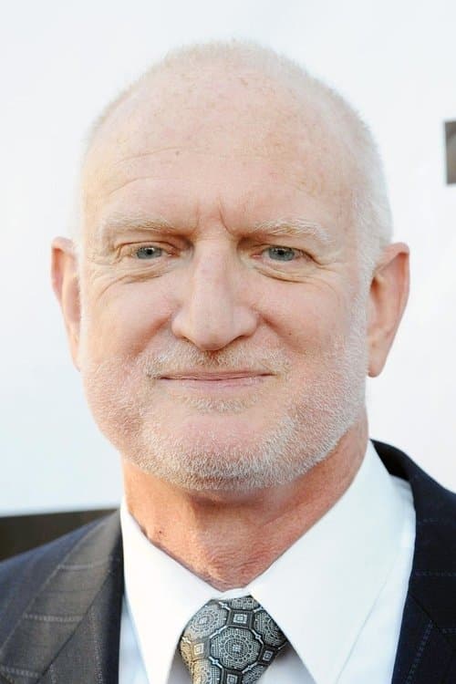 A portrait of Gilbert Adler