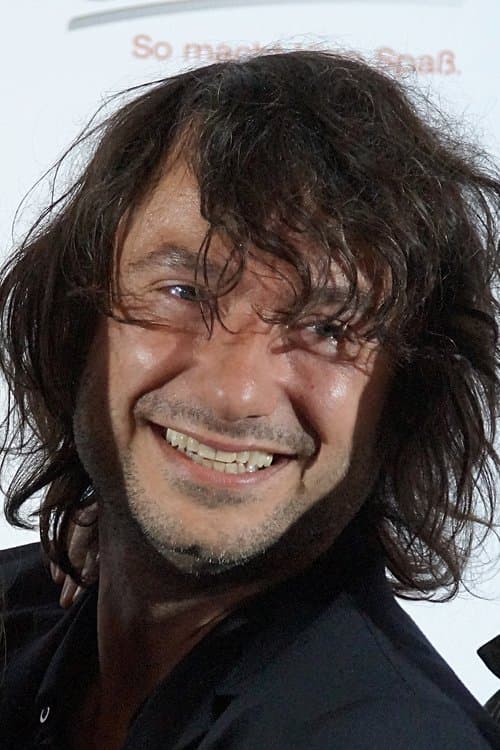 A portrait of Granz Henman