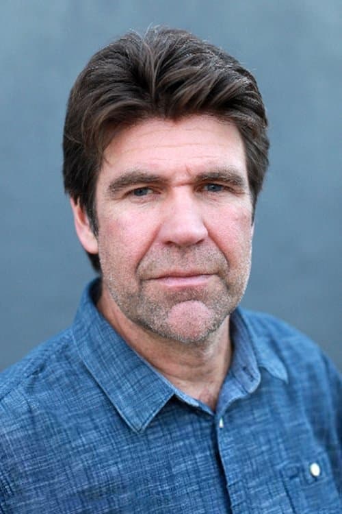 A portrait of Greg Barker