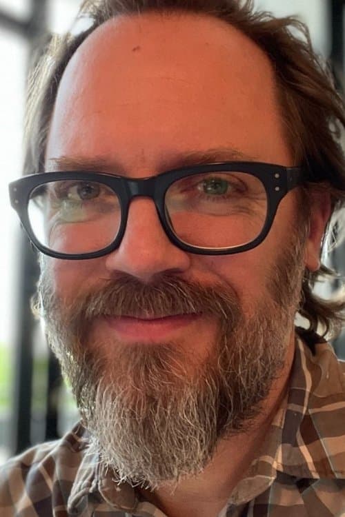 A portrait of Greg Olliver