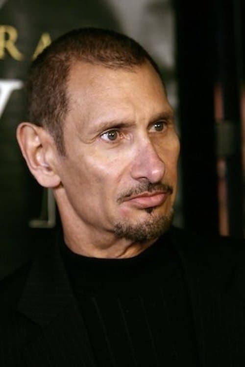 A portrait of Gregory Dark