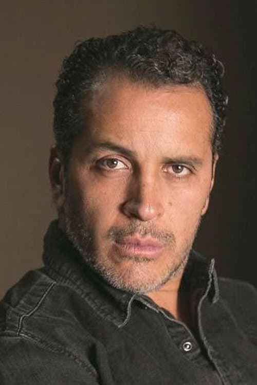 A portrait of Gustavo Loza