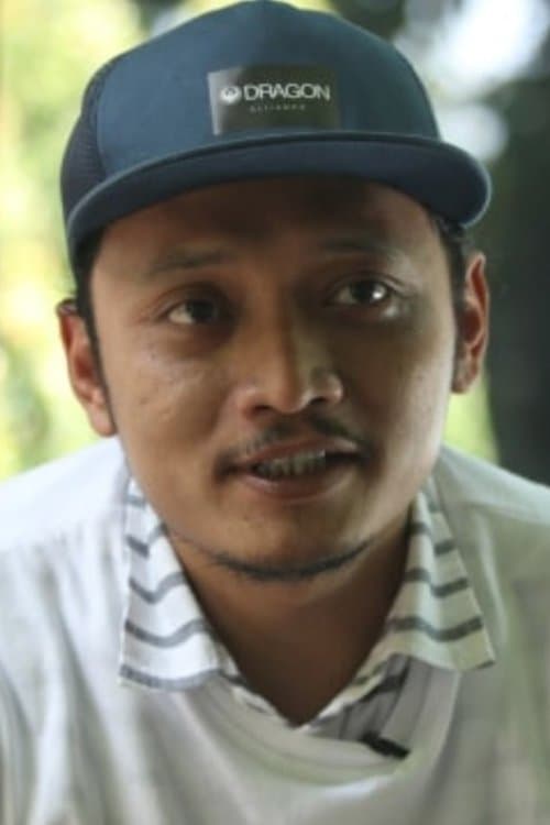 A portrait of Hestu Saputra