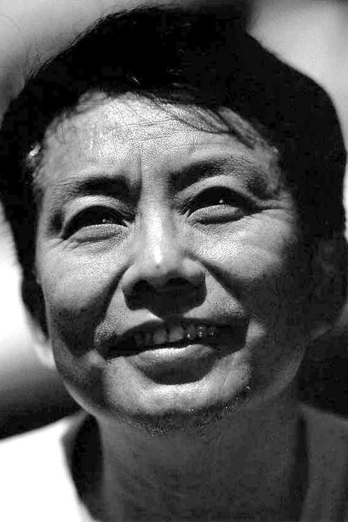 A portrait of Huang Jianxin