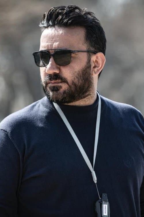 A portrait of Jamshid Mahmoudi