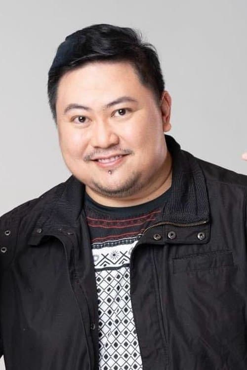 A portrait of Jason Paul Laxamana