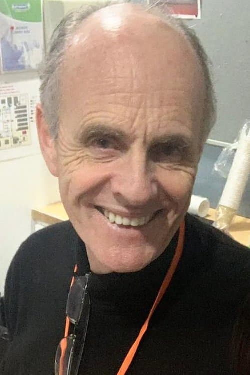 A portrait of John Strickland