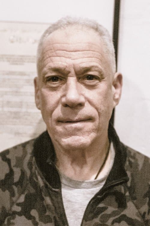 A portrait of Jon Alpert