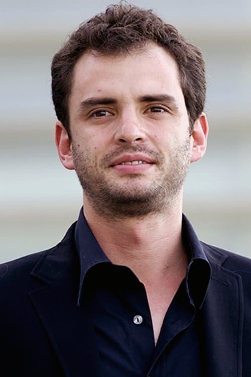 A portrait of Jonás Cuarón